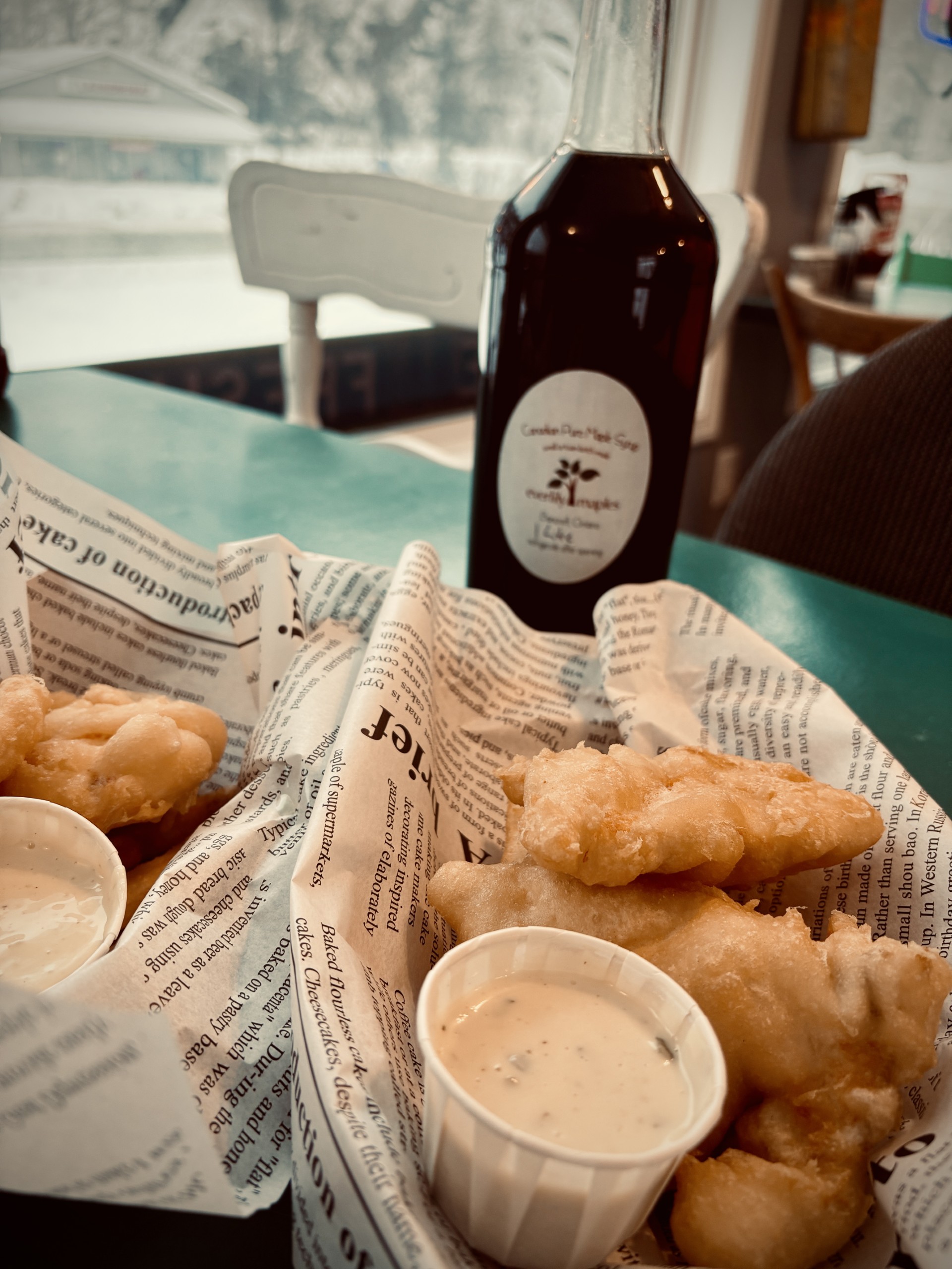 Fish, chips, tarter sauce with maple syrup