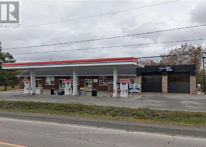 Front facade view of a gas station for sale in Marmora