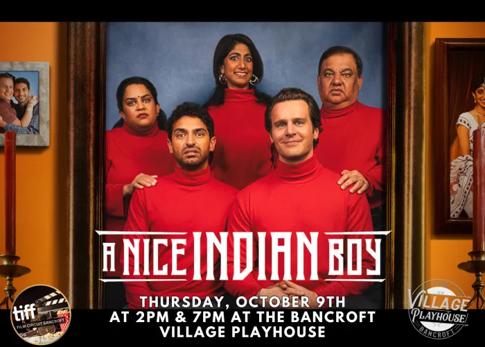 A Nice Indian Boy Poster. A Family poses for a picture wearing red sweaters.