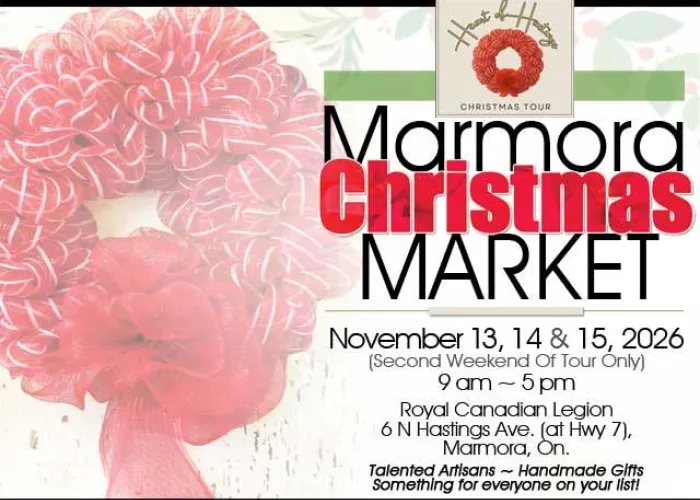 Red ribbon wreath in background, event details in black text on right, heart of hastings logo at top
